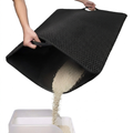 Litter Trap Mat — pouring trapped litter from between the double layers back into the box